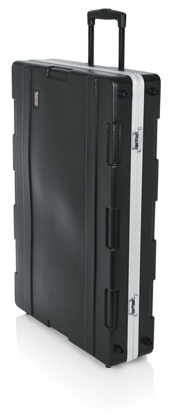 MOLDED PE MIXER OR EQUIPMENT CASE; 24" X 36" X 6.5"; W/ WHEELS