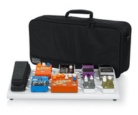 WHITE LARGE ALUMINUM PEDAL BOARD WITH GATOR CARRY BAG AND BOTTOM MOUNTING POWER SUPPLY BRACKET.