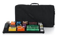 BLACK EXTRA LARGE ALUMINUM PEDAL BOARD WITH CARRY BAG AND BOTTOM MOUNTING POWER SUPPLY BRACKET.